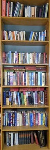 lot 83 image: Large Assortment of Books 2011 The World Almanac, Cold is The Grave, Looking Back, The Last Full Measure, Your Oasis on Flame Lake, Waiting For Snow in Havana, Shadow Song, The Mermaid Chair, Swede Hallow and Much More