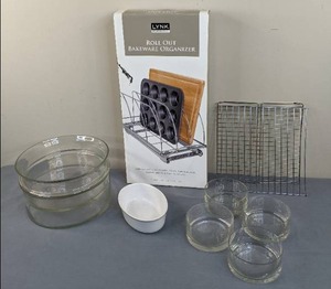 lot 65 image: Kitchen Wares Glass Bowls, Wire Racks, Brand New Lynk Roll Out Bakeware Organizer, and More