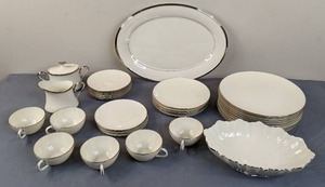 lot 56 image: Vintage 35-Piece Lenox Porcelain Dishes in Solitaire and Symphony Patterns