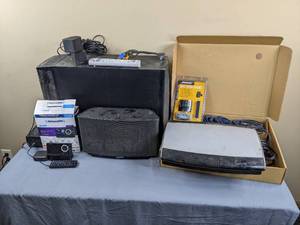 lot 95 image: Bose Media Center, Sirius XM Home Set Up, and Sonos Wireless Music System
