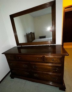 lot 26 image: Ethan Allen Seven Drawer Mirrored Dresser Measuring 56 Wide By 21 Deep By 33 And 70 With The Mirror