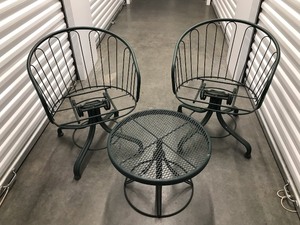 lot 72 image: Pair Of Metal Swivel Patio Chairs, And Matching Table. No Cushions Included. Measuring 24 X 22 X 30 Tall