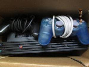 lot 3 image: playstation 2 with controllers...