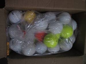 lot 22 image: golf ballls plus tees...