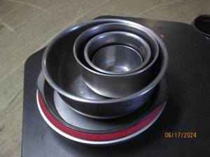 lot 35 image: round cake pans and stainless steel mixing bowl set