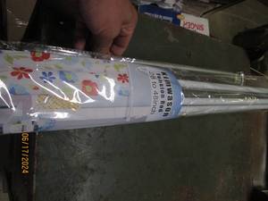 lot 41 image: 4 tension rods and 2 magnetic rods...