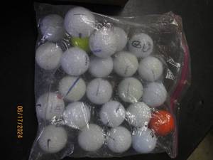 lot 54 image: golf ballls plus tees...