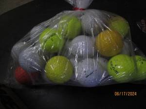 lot 55 image: golf ballls plus tees...