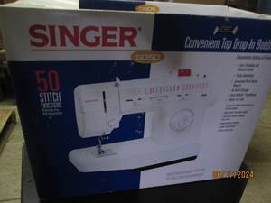 lot 57 image: singer sewing machine...