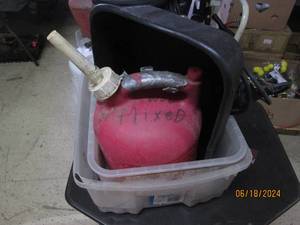 lot 61 image: totes, containers , gas can and drill
