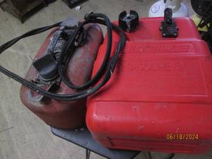 lot 63 image: 2 boat gas cans 1 metal 1 plastic...