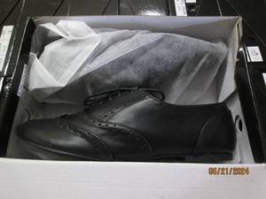 lot 131 image: case of 18 pairs of various size new shoes