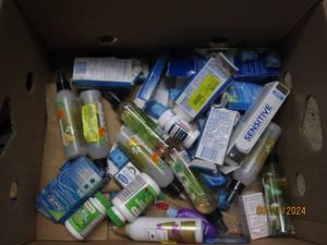 lot 218 image: box of medince and scotch guard...