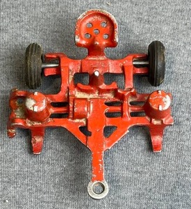 lot 18 image: Vintage Arcade Cast Iron Corn Planter 422 & Vintage John Deere Diecast Tractor 116 Scale (Missing steering wheel and front wheels)