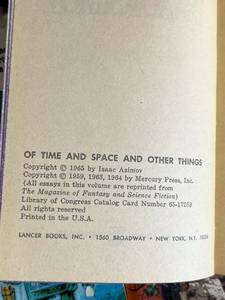 lot 94 image: Amazing Sci-Fi Soft Cover Book Collection including Authors Isaac Asimov, George Gamow, Richard S. Lewis, H.G. Wells, and More