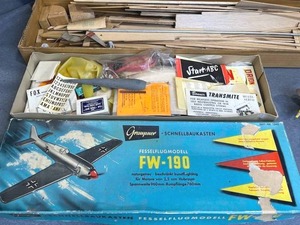 lot 152 image: Neat Vintage Model RC Plane Kits including Testor P40 RC PlanePiper Cub J-3Graupner FW-190