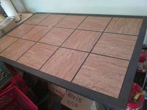 Metal framed tile top outdoor patio...