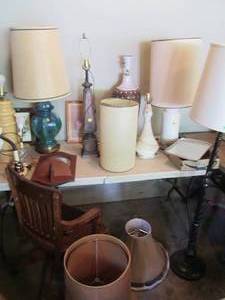Tabletop full of vintage lamps, sha...