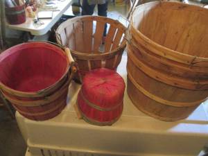 Bunch of wooden Bushel Baskets in v...