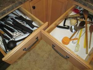 (2) drawers of long handled cooking...