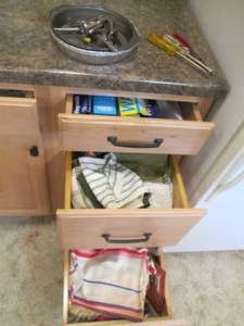 (3) drawers of dish towels, oven mi...