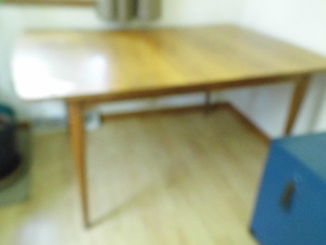 Walnut dining room table with (2) l...