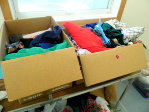 (2) boxes of assorted fabrics and m...