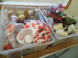 (2) Storage totes of assorted decor...