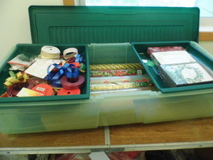 Long storage tote of Christmas pape...