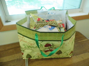 large gift bag with a variety of gi...