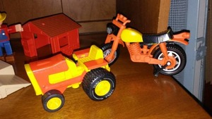lot 15 image: Vintage Tonka Motorcycle, Tonka Tractor  And More.