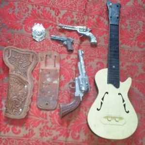 lot 28 image: Vintage Hubley Pony Boy Metal Cap Gun And More.