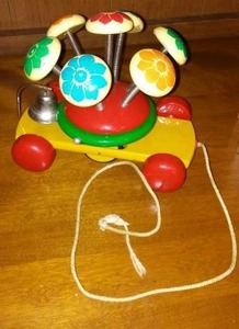 lot 35 image: Vintage Kouvalias Wooden Pull Toy And More.