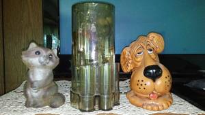 lot 67 image: Raccoon, Puppy (Circa 70s)  Piggy Banks, And A Money Mill.
