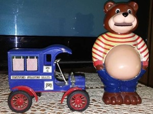 lot 69 image: ERTL  Replica 1905 Ford And Bear Piggy Banks.