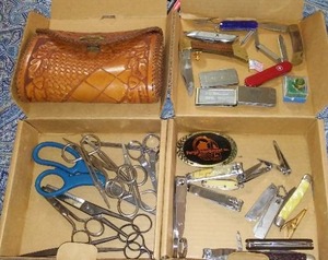 lot 82 image: John Deere Belt Buckle, Leather Clutch and More.