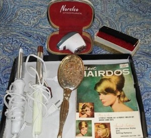 lot 83 image: Beauty Collection Curling Irons, Brush, Shaver and more.