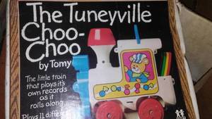 lot 246 image: Vintage Toy Tomy Tuneyville Choo - Choo Train With Box. & 4 music discs.