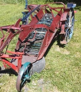 lot 277 image: Antique Potato Digger wSteel Wheels.