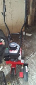 lot 424 image: Gas Powered Edger. virtually NEW