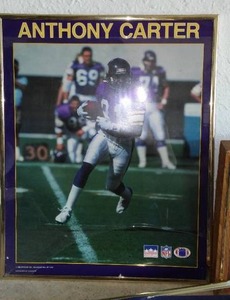 lot 303 image: Anthony Carter Vikings Posters and  Clocks (2).