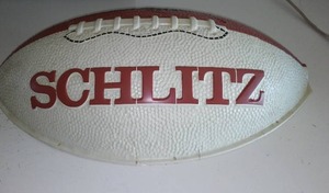 lot 308 image: Schiltz Football Sign (Plastic)