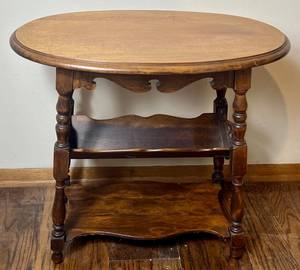 lot 34 image: Oval Wooden Side Table with Book Rack