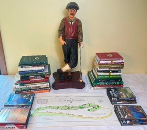 lot 88 image: Golfing Bundle - Books, 27.5 Statue, Throw and DVDs