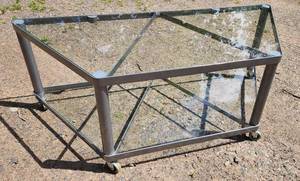 lot 39 image: Glass & Metal Coffee Table 2 tier Table on wheels