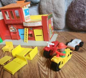lot 48 image: Vintage Fisher Price Fire House with FP Accessories