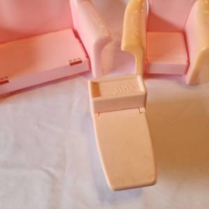 lot 53 image: Vintage Barbie Pink Furniture