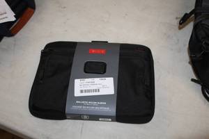lot 105 image: Tumi Ballistic Nylon Laptop Sleeve