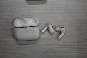 lot 42 image: Apple AirPods Earbuds with Charging Station  Case