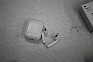lot 45 image: Earbuds with Charger Case